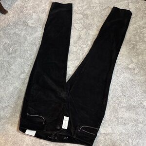 WHBM Black velvet Skinny Jeans with silver trim on pockets. New. size 10 short